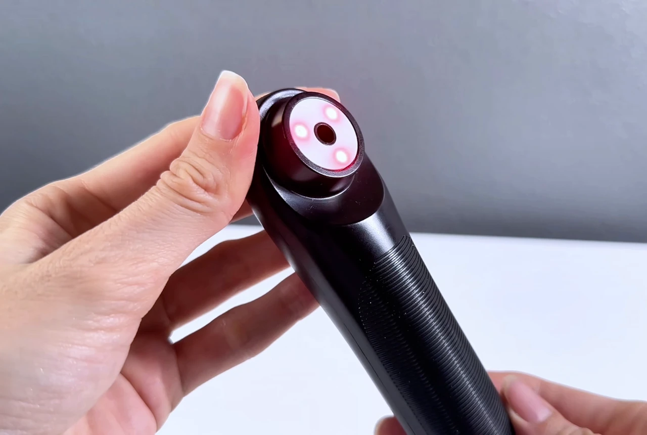 Close view of the real STOGA IRH-1 ceramic contact surface, central suction opening, and visible red lights